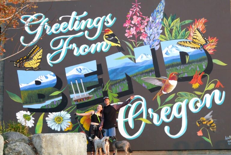 Us in front of the Bend Oregon mural in the Old Mill.