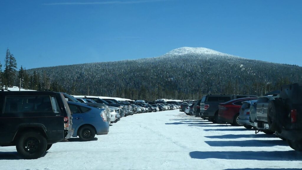 Cars in the West Village Parking lot at Mt. Bachelor.