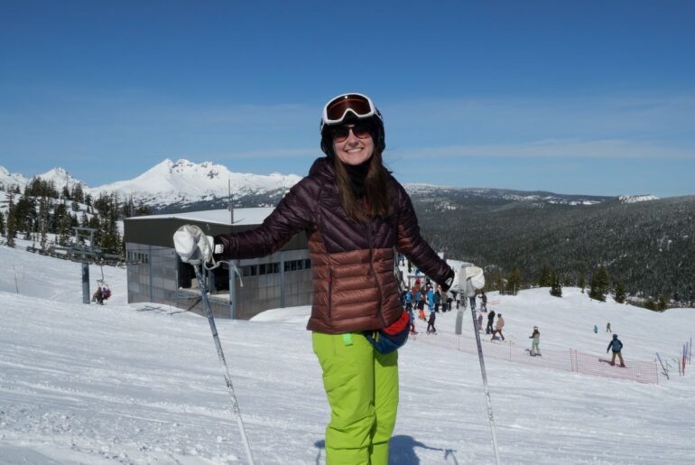 A skier enjoying a sunny day on Mount Bachelor.