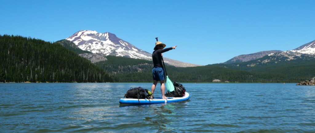 Abby paddleboarding near Bend at Sparks Lake.