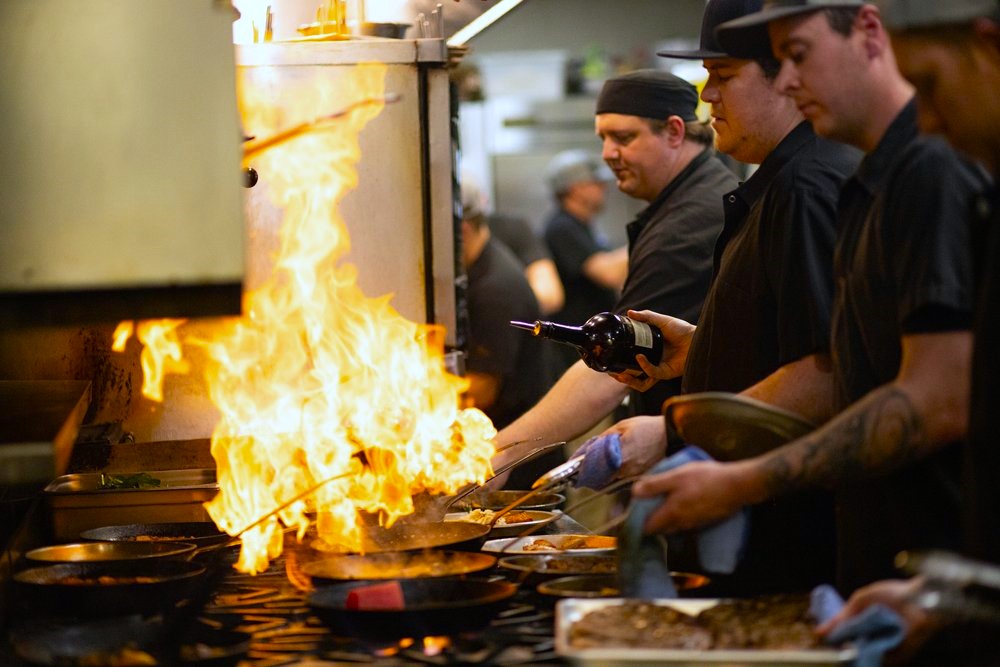 Chefs cooking in Zydeco Kitchen in Bend Oregon.