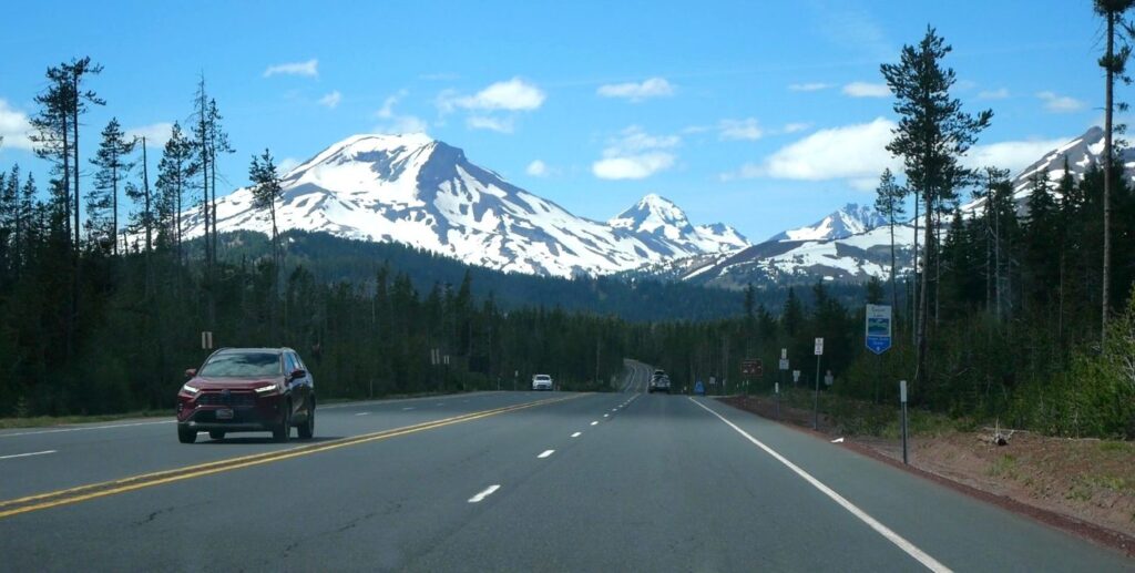 Mountain views through the windshield on the Cascade Lakes Scenic Byway.