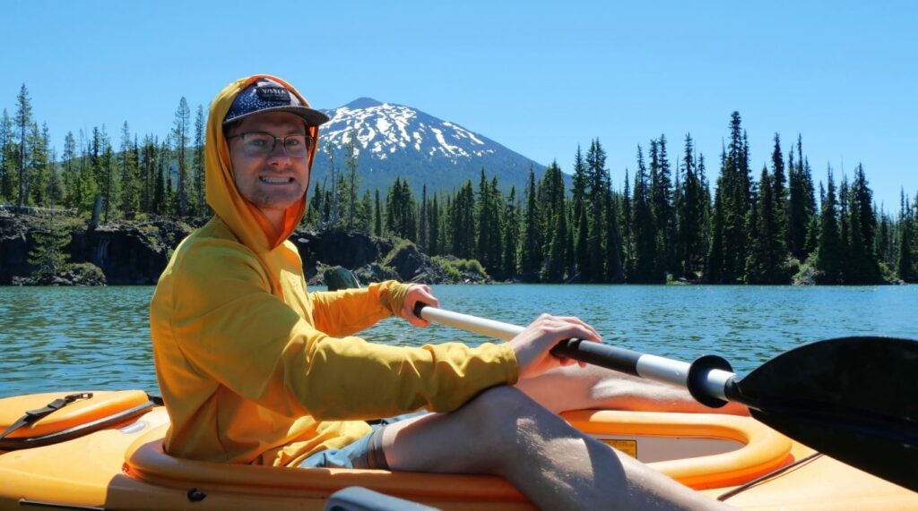 Logan kayaking on Sparks Lake in Oregon.