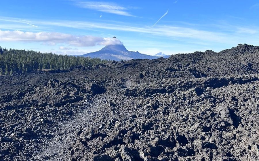 Looking towards Mt. Washington over lava fields on the Belknap Crater Trail.