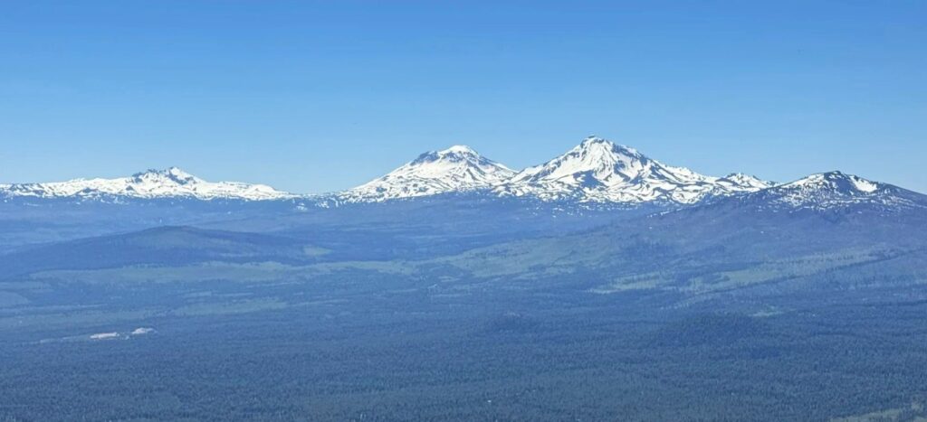 Views of Broken Top and the Three Sisters from the top of Black Butte.