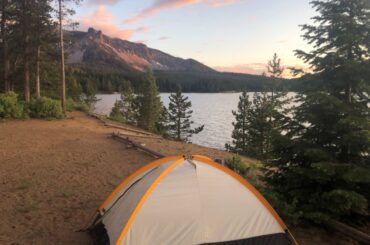 A tent at a lakeside campsite at Paulina Lake Oregon.