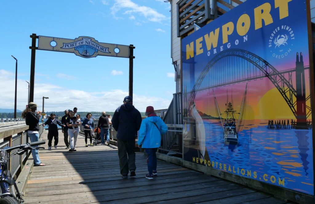 People walking around the historic bayfront in Newport Oregon.