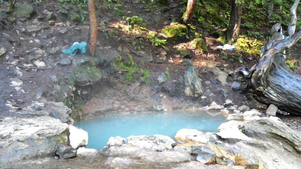 The hottest pool at Umpqua Hot Springs. You can see some old clothes people have left behind. It's important to pack out what you pack in.