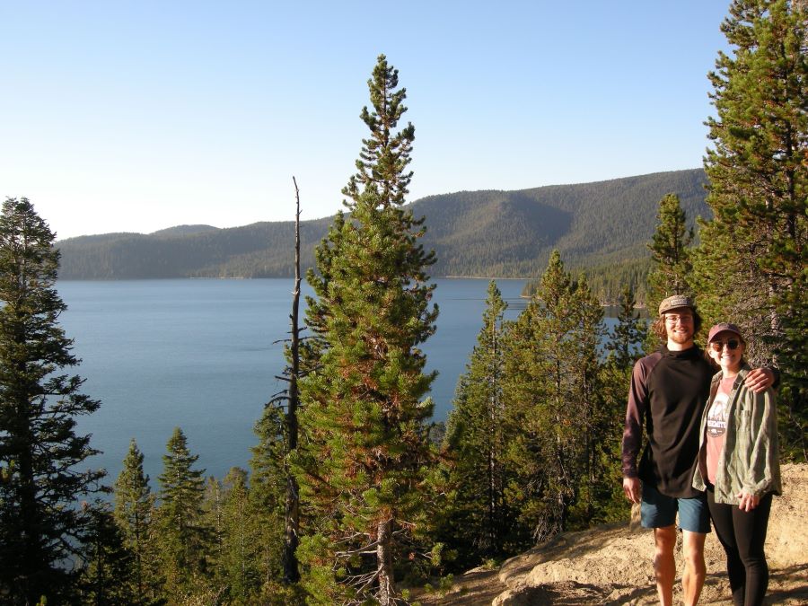 Two people hiking at Paulina Lake Oregon.