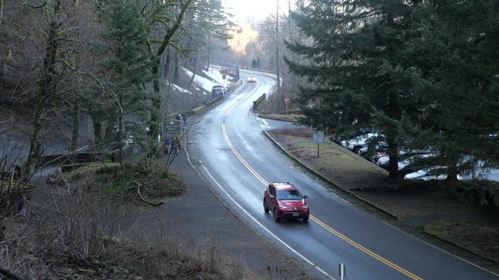 The Historic Columbia River Highway and the parking lot at Horsetail Falls.
