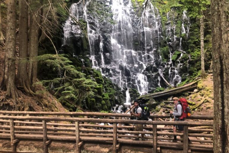 Hikers at Ramona Falls in Oregon