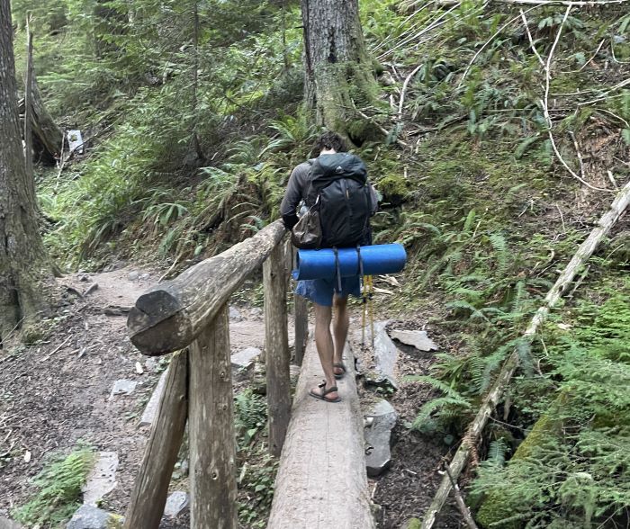 A hiker on their way to Ramona Falls