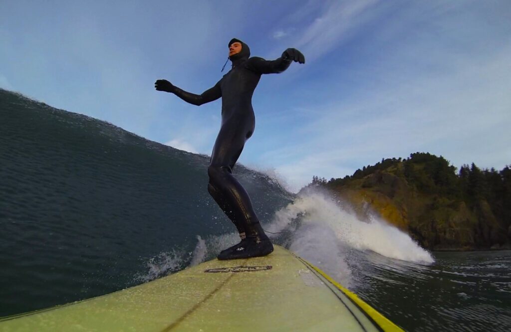 Logan surfing at Agate Beach Oregon.