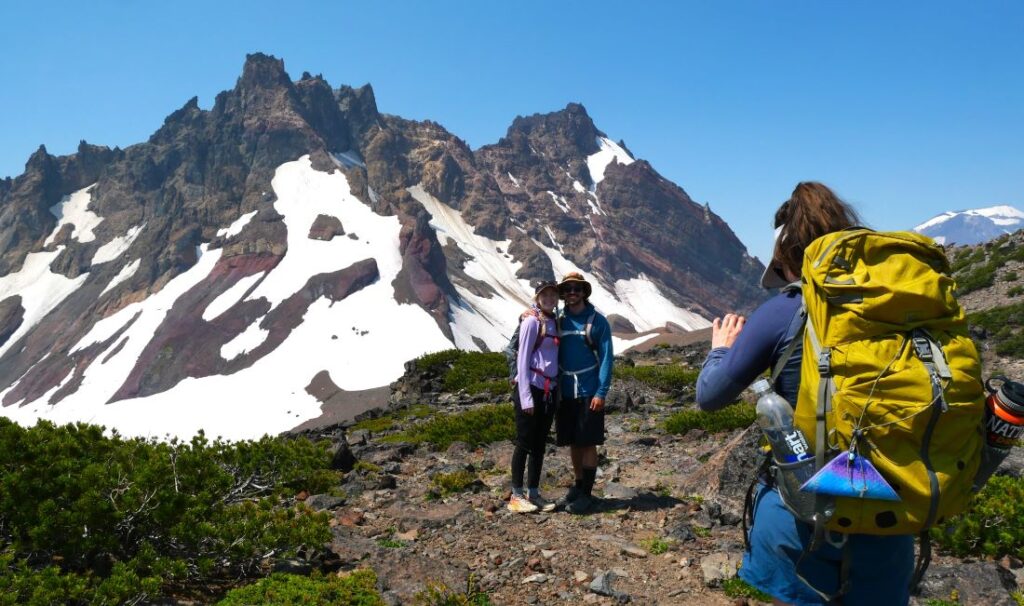 Hikers posing for a photo on the Tam McArthur Rim Trail.