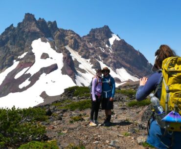 Hikers posing for a photo on the Tam McArthur Rim Trail.