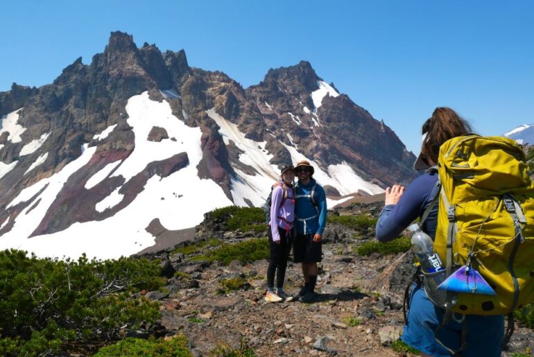 Hikers posing for a photo on the Tam McArthur Rim Trail.