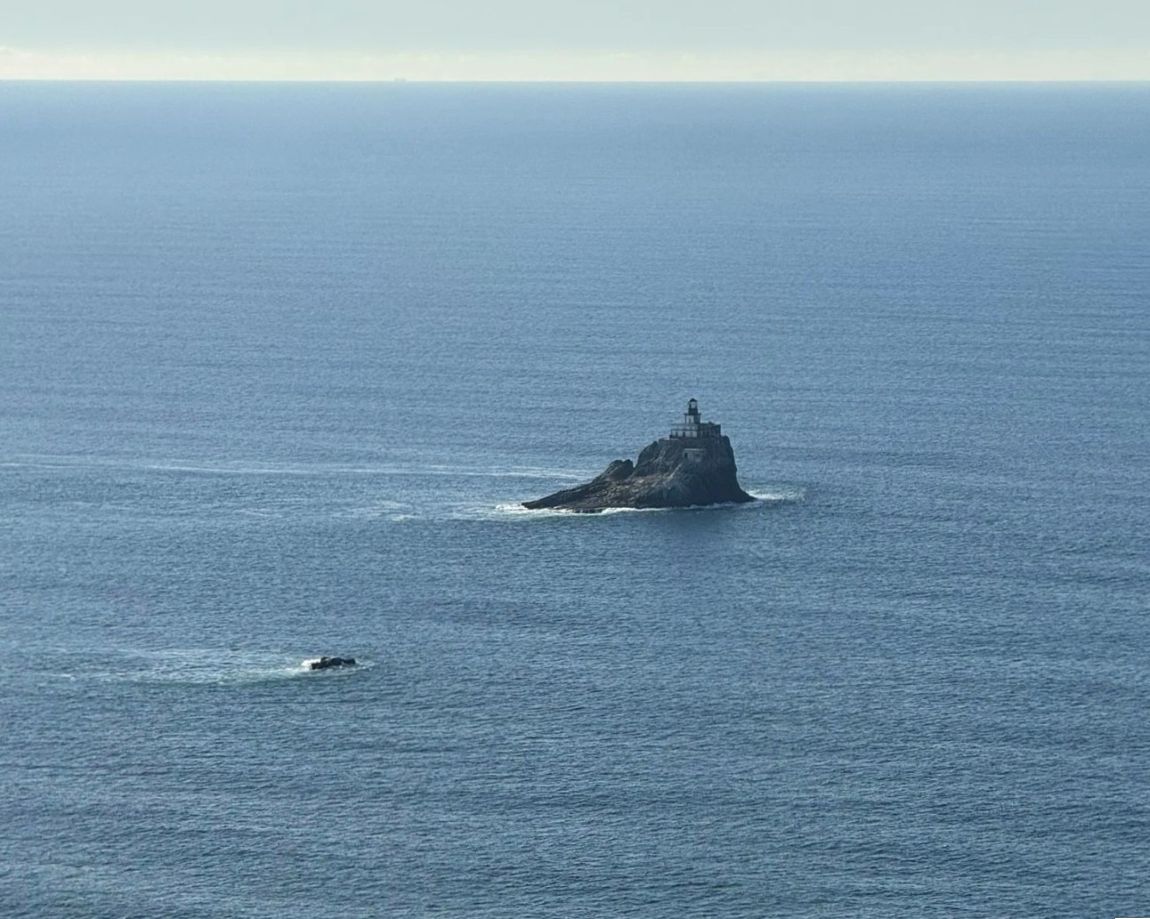 Views of the Tillamook Lighthouse from Ecola State Park, one of the best hiking areas near Cannon Beach.