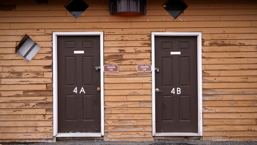 Doors to the private soaking rooms at Crane Hot Springs.