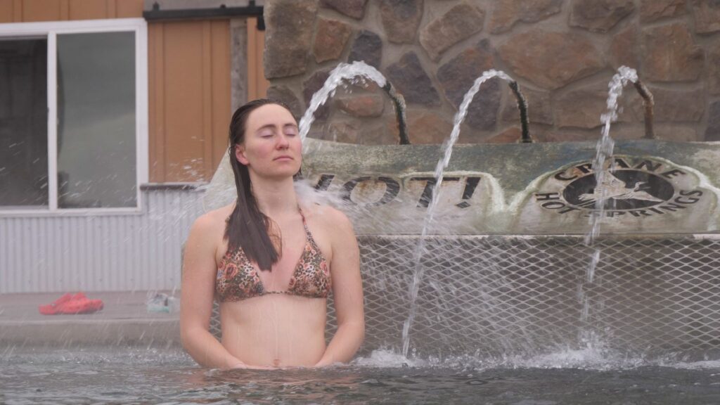 Abby braving the hot water.